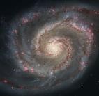 Törpegalaxisok bekebelezésével növekednek a spirálgalaxisok
